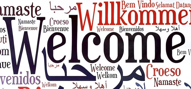 Das Bild zeigt den Schriftzug Willkommen in verschiedenen Sprachen